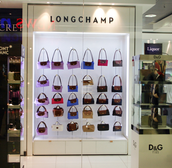 Longchamp bags opening at Guam Airport - Duty Free Hunter